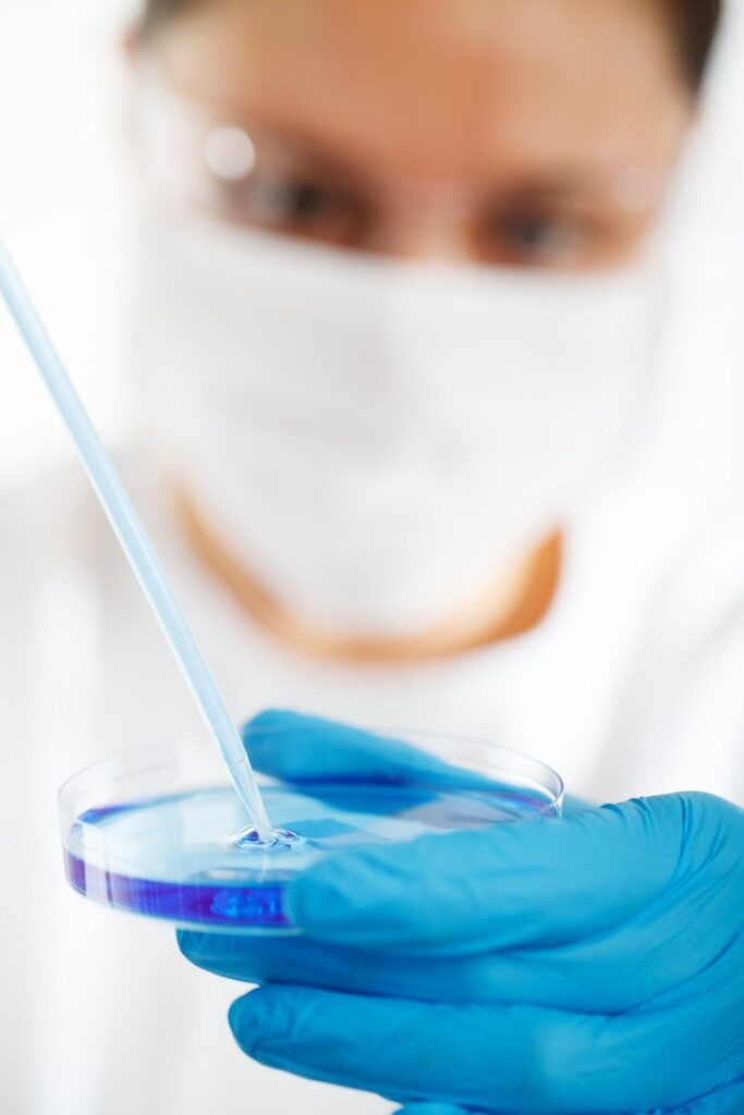 Peptide Synthesis Process: 12 Essential Steps Every Researcher Should Understand scientist performing peptide synthesis process in laboratory